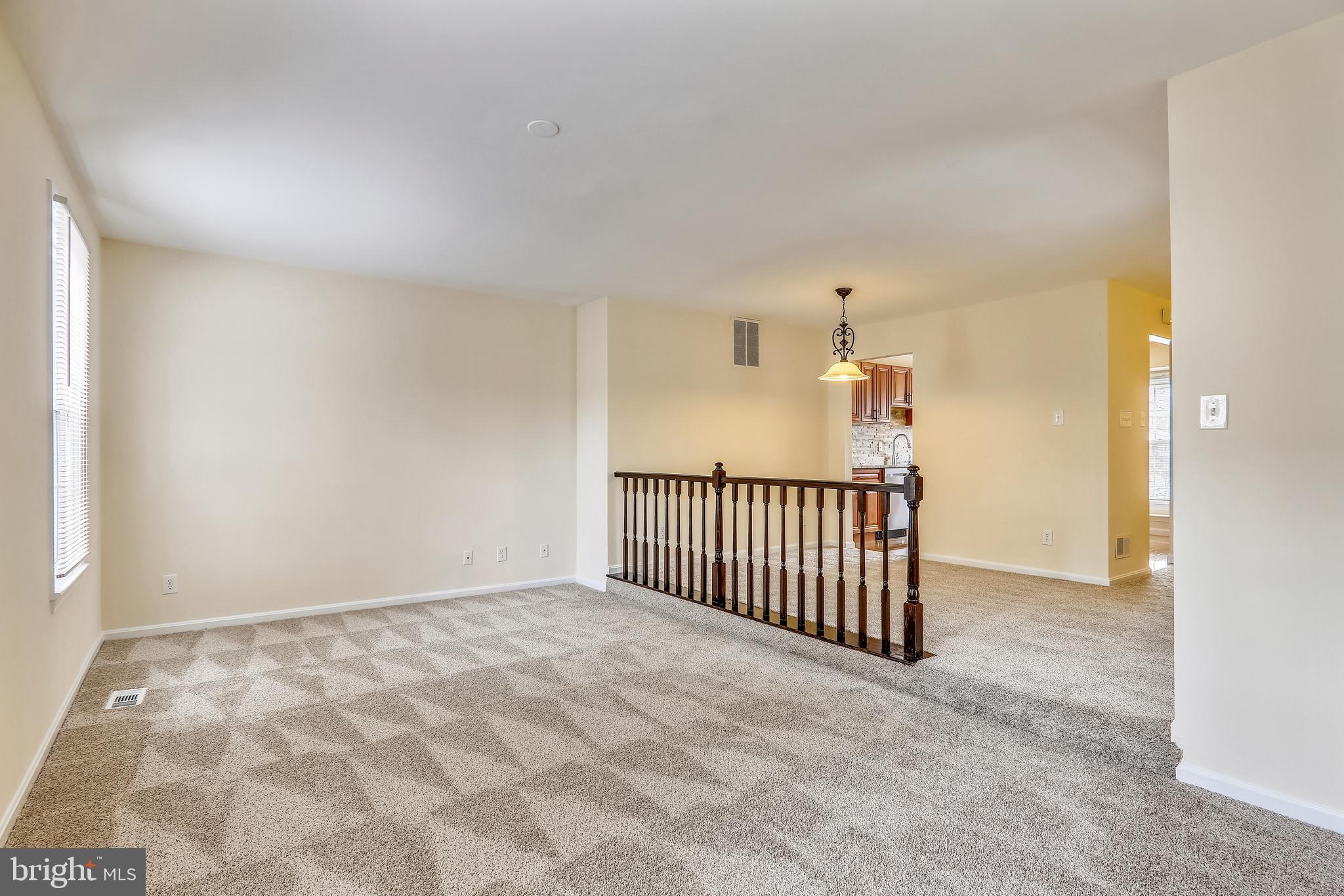 10600 Georgia Avenue Silver Spring, MD 20902 - Photo 11 of 44 Main level step-down living room