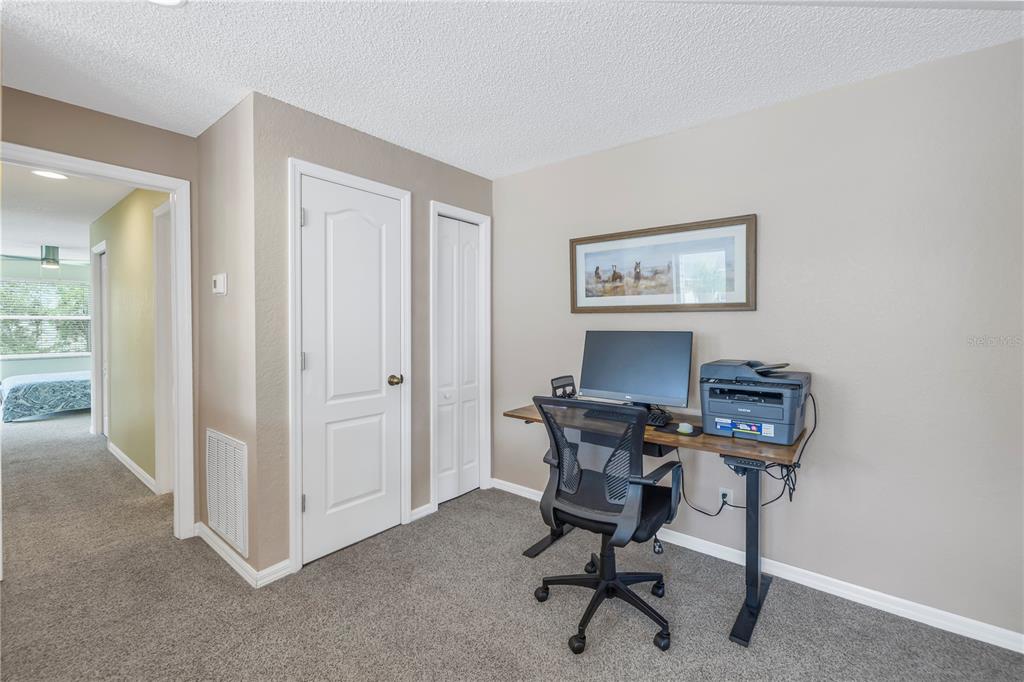 1050 Starkey Road, Unit 2201 Largo, FL 33771 - Photo 24 of 66 a view of a workspace with furniture