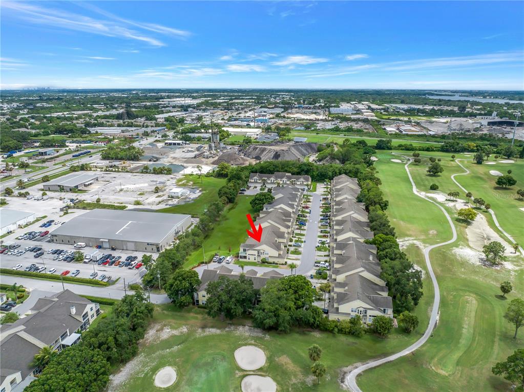 1050 Starkey Road, Unit 2201 Largo, FL 33771 - Photo 65 of 66 an aerial view of a residential houses with outdoor space and trees