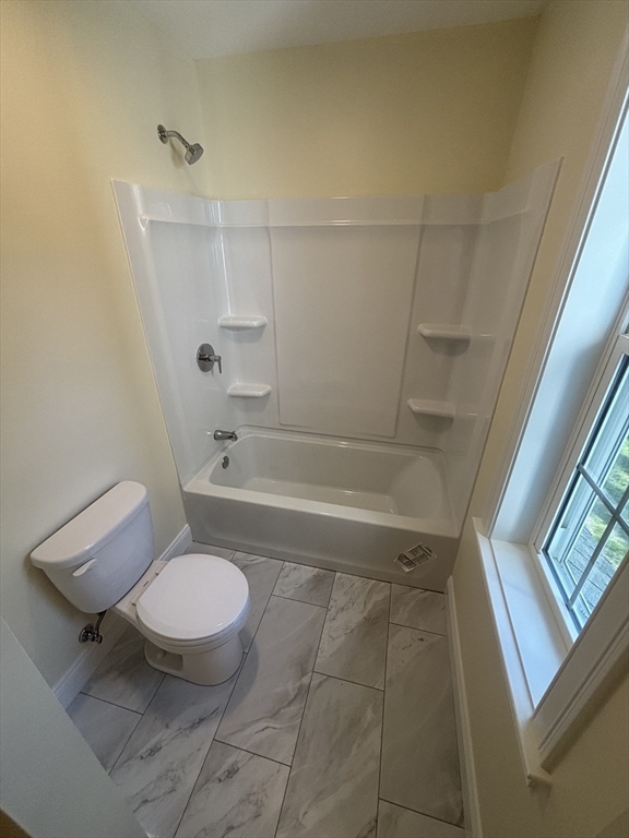 14 A Welch Avenue, Unit A Rutland, MA 01543 - Photo 15 of 25 a bathroom with sink toilet and shower