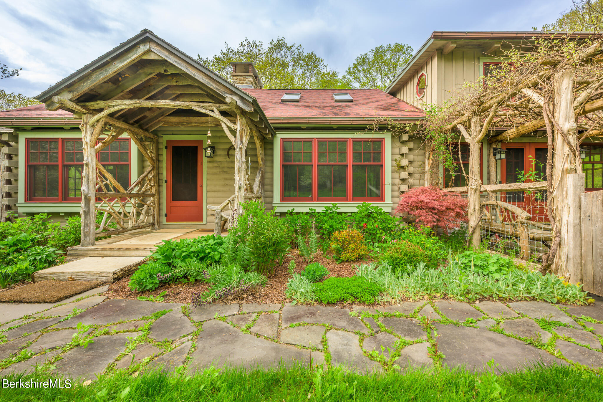 front view of a house with a small yard
