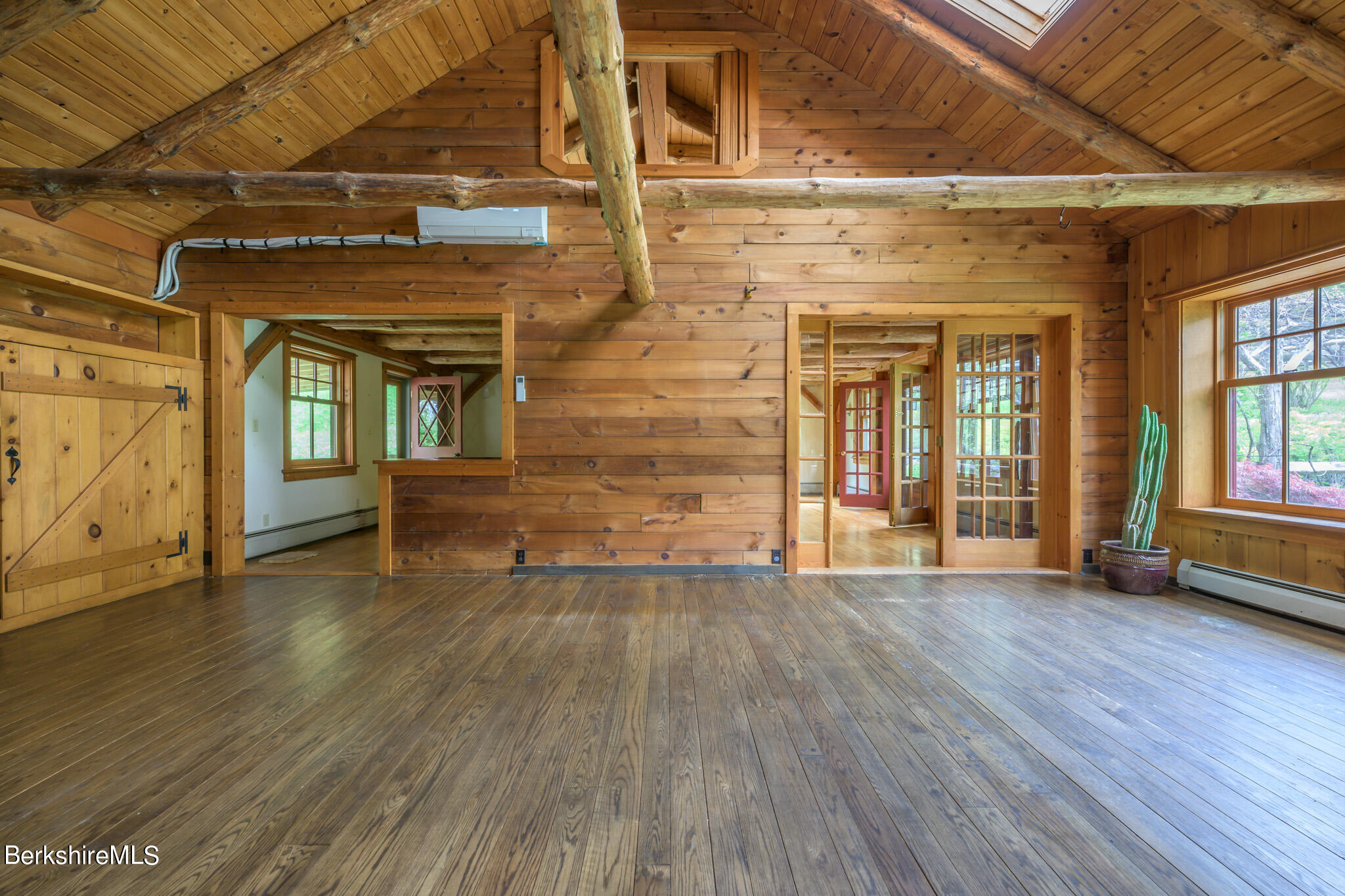 258 E Road Alford, MA 01266 - Photo 17 of 38 an empty room with wooden floor and windows