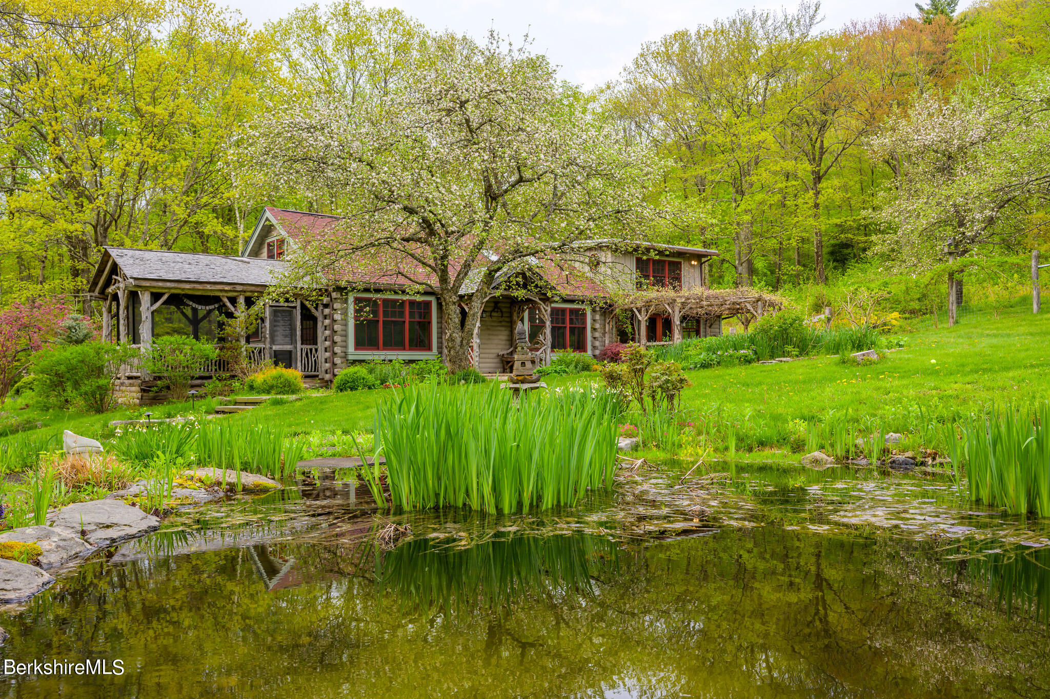 258 E Road Alford, MA 01266 - Photo 5 of 38 a front view of a house with a yard