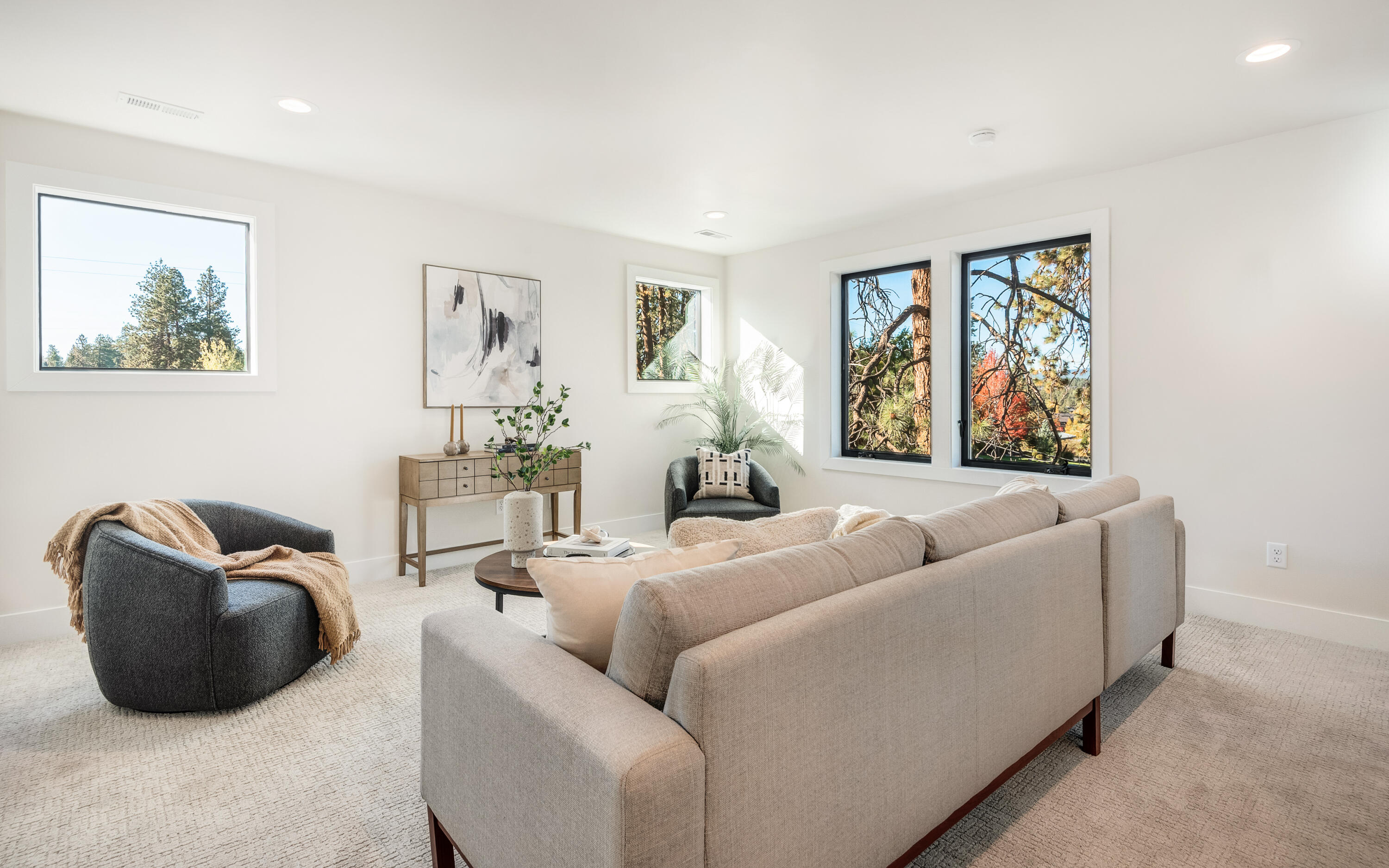 334 Southwest Roosevelt Avenue, Unit 4 Bend, OR 97702 - Photo 18 of 22 a living room with furniture and a large window
