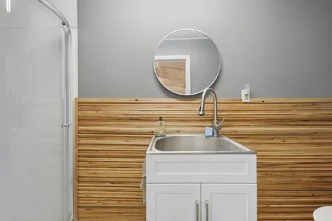 a sink with a mirror