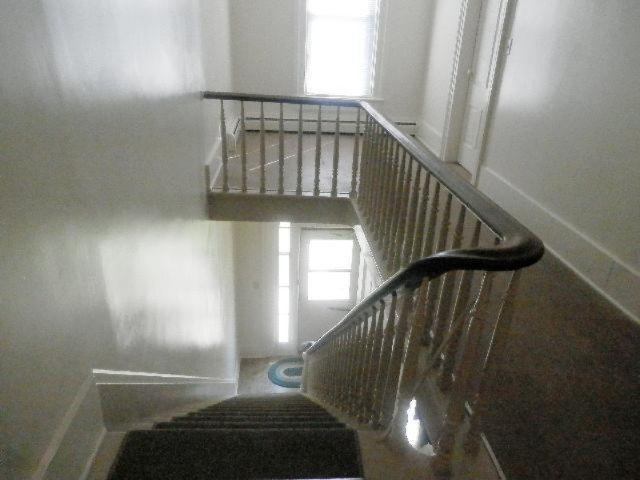260 3rd Street Manistee, MI 49660 - Photo 19 of 32 264 Third St Staircase