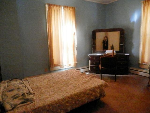 260 3rd Street Manistee, MI 49660 - Photo 22 of 32 264 Third St Bedroom