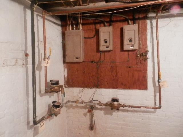 260 3rd Street Manistee, MI 49660 - Photo 24 of 32 264-260 Third St separate water meters