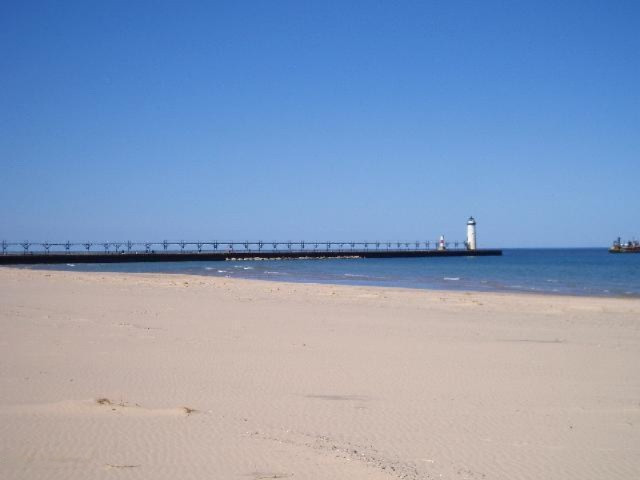 260 3rd Street Manistee, MI 49660 - Photo 31 of 32 Beach with catwalk lighthouse