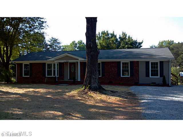 5606 Bunch Road Oak Ridge, NC 27310 - Photo 2 of 16 Exterior Front. Handsome facade greets you from Bunch Road