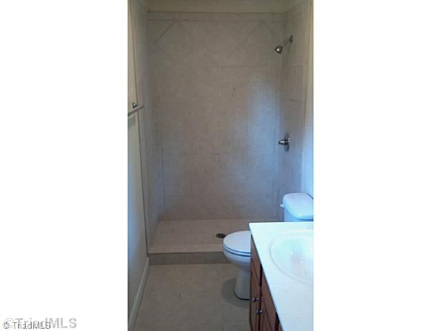 5606 Bunch Road Oak Ridge, NC 27310 - Photo 11 of 16 Master Bath/Spa. Master Bath is also all new and features an oversized tile shower