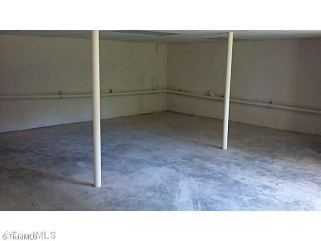 5606 Bunch Road Oak Ridge, NC 27310 - Photo 14 of 16 Other. Just one of 3 rooms in the full unfinished basement. This room and another have baseboard heat and would be perfect for a workshop, game room or just storage
