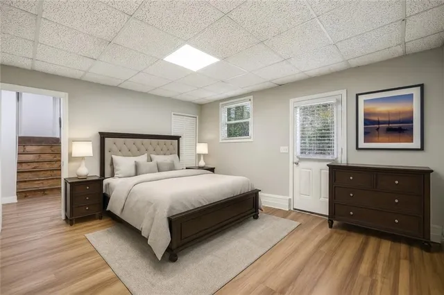 a bedroom with a bed and a dresser