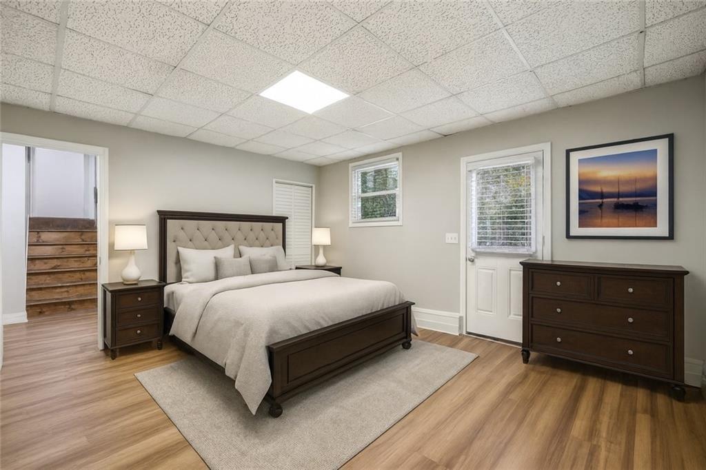 1076 Blackwell Road Marietta, GA 30066 - Photo 24 of 34 a bedroom with a bed and a dresser