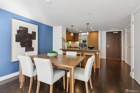 a bedroom with a bed and glass window