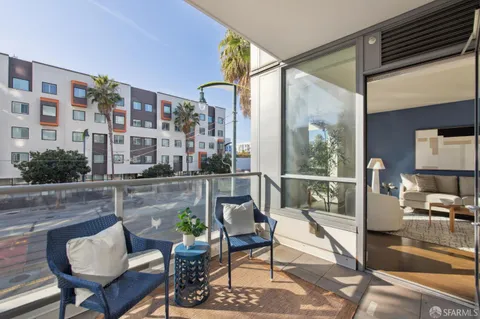 a view of a lake from a balcony