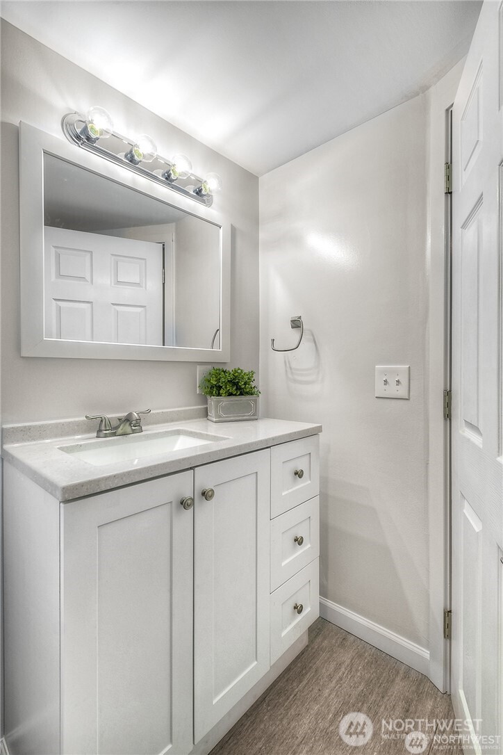 32407 72nd Avenue South Roy, WA 98580 - Photo 12 of 24 a bathroom with a sink and a mirror
