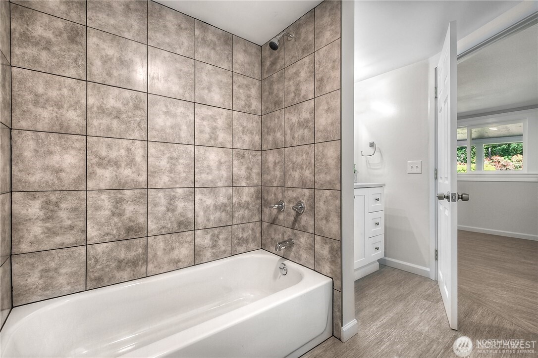 32407 72nd Avenue South Roy, WA 98580 - Photo 13 of 24 a bathroom with a bathtub and shower