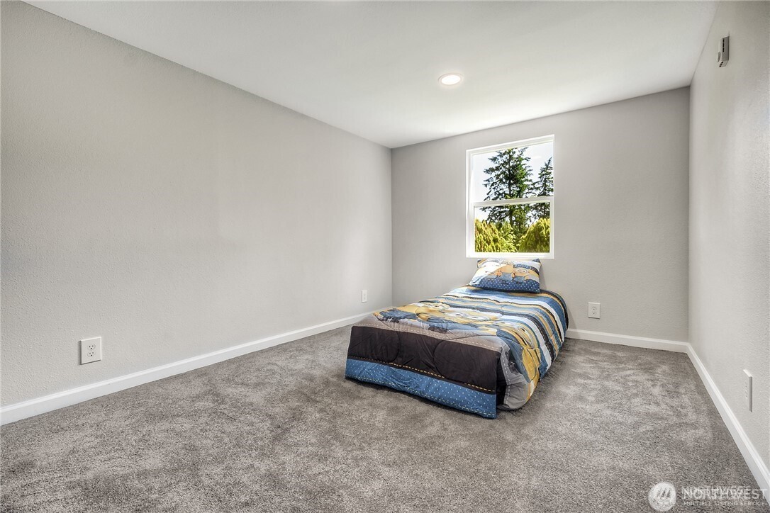 32407 72nd Avenue South Roy, WA 98580 - Photo 16 of 24 a room with a bed and a window