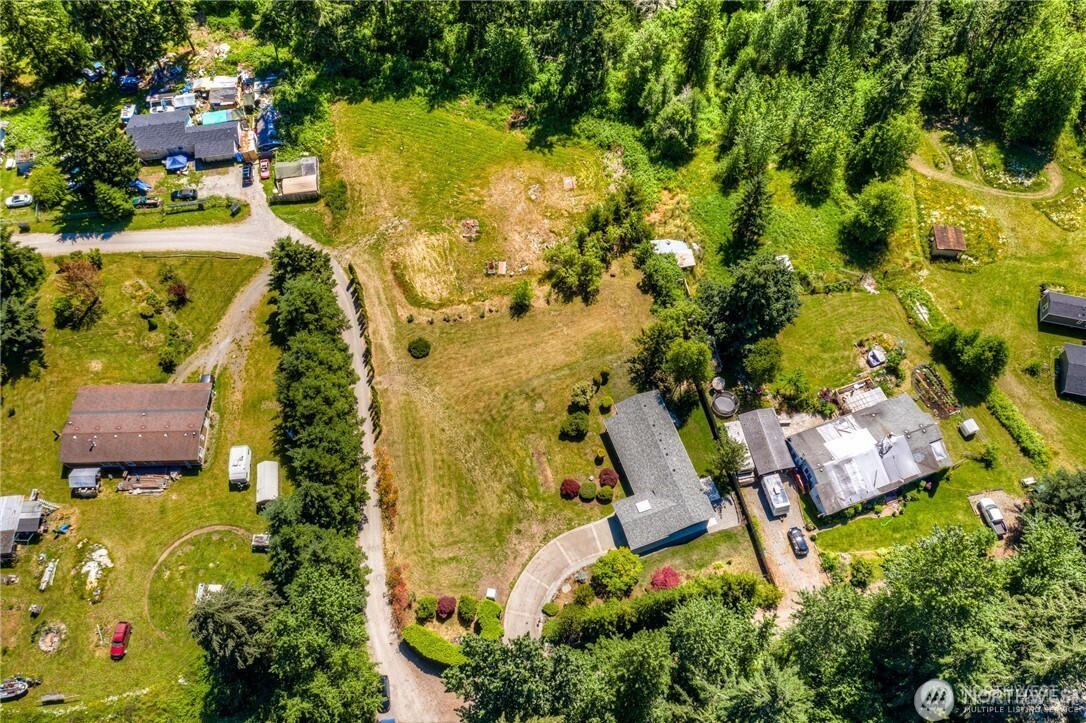 32407 72nd Avenue South Roy, WA 98580 - Photo 23 of 24 an aerial view of residential house with swimming pool and lawn chairs