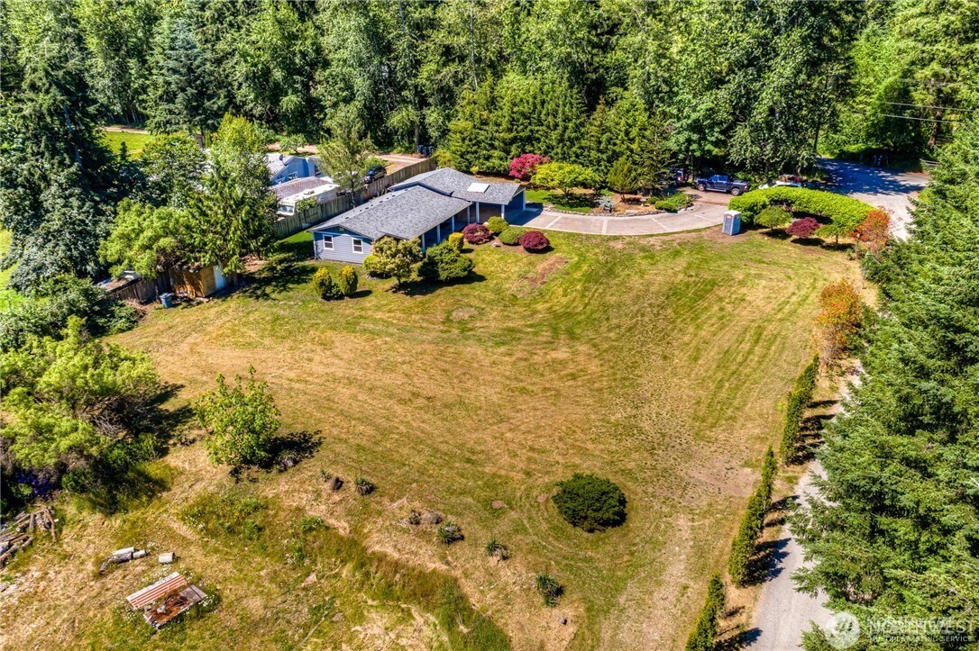 32407 72nd Avenue South Roy, WA 98580 - Photo 24 of 24 a backyard of a house with table and chairs