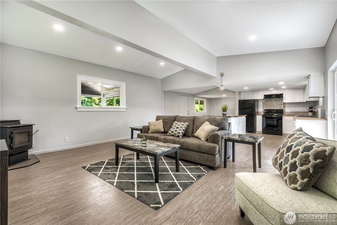 32407 72nd Avenue South Roy, WA 98580 - Photo 6 of 24 a living room with furniture window and a wooden floor