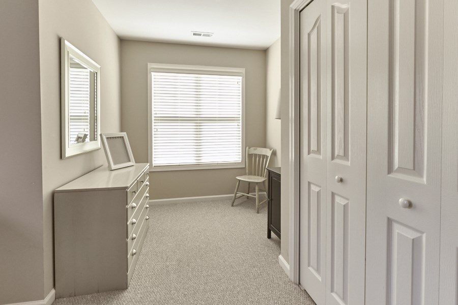 8518 Eden Park Drive Raleigh, NC 27613 - Photo 21 of 25 Bedroom #4, upstairs. Features extra space to use as a sitting area or for additional storage