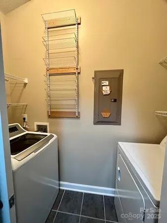 a utility room with dryer and washer