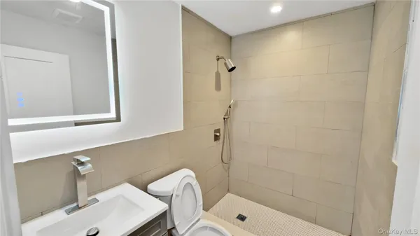 a bathroom with a sink and a shower