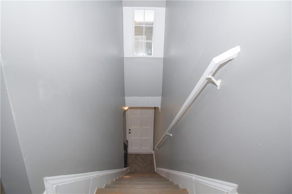2340 Beaver Ruin Road, Unit UN7 Norcross, GA 30071 - Photo 18 of 20 a view of entryway with stairs