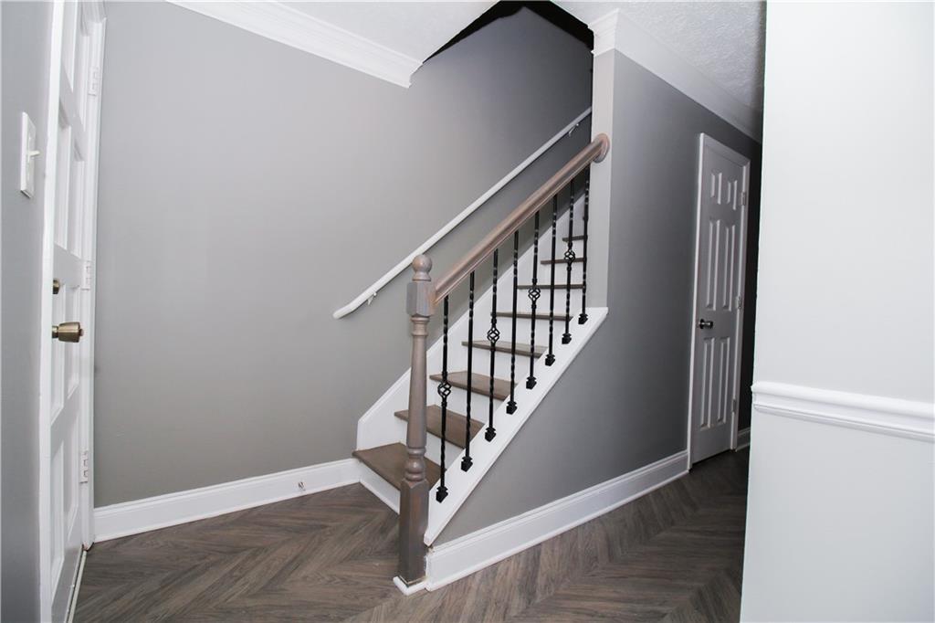2340 Beaver Ruin Road, Unit UN7 Norcross, GA 30071 - Photo 19 of 20 a view of entryway with wooden floor