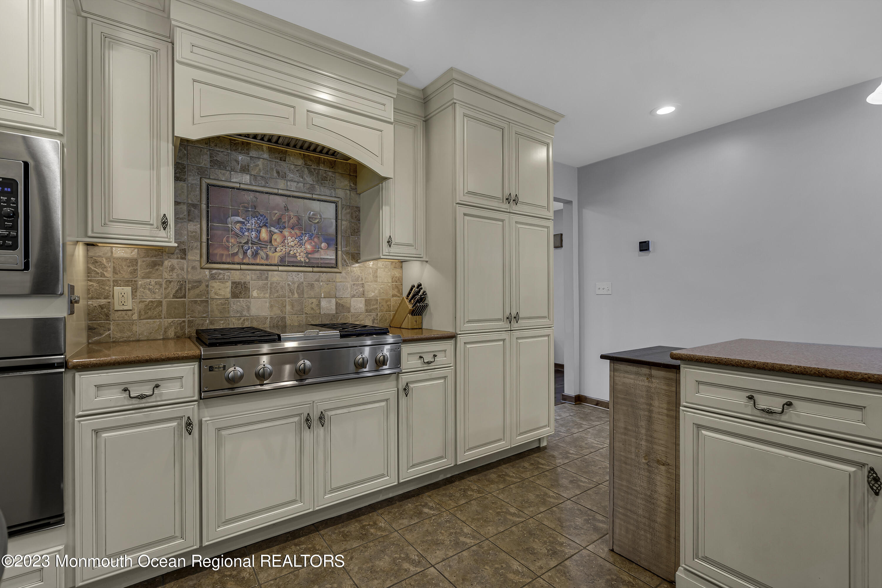 3 Allen Terrace New Egypt, NJ 08533 - Photo 23 of 97 a kitchen with stainless steel appliances a stove and white cabinets
