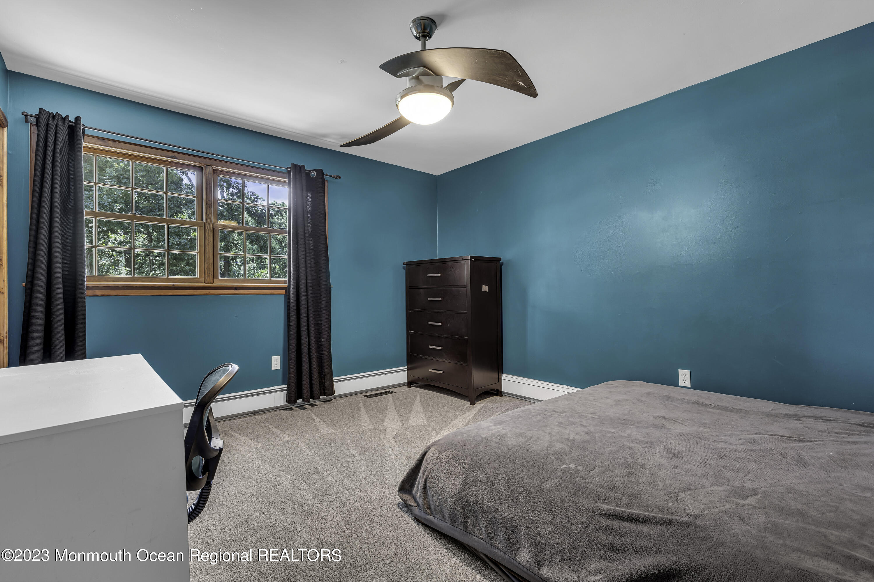 3 Allen Terrace New Egypt, NJ 08533 - Photo 39 of 97 a bedroom with a bed and a chandelier