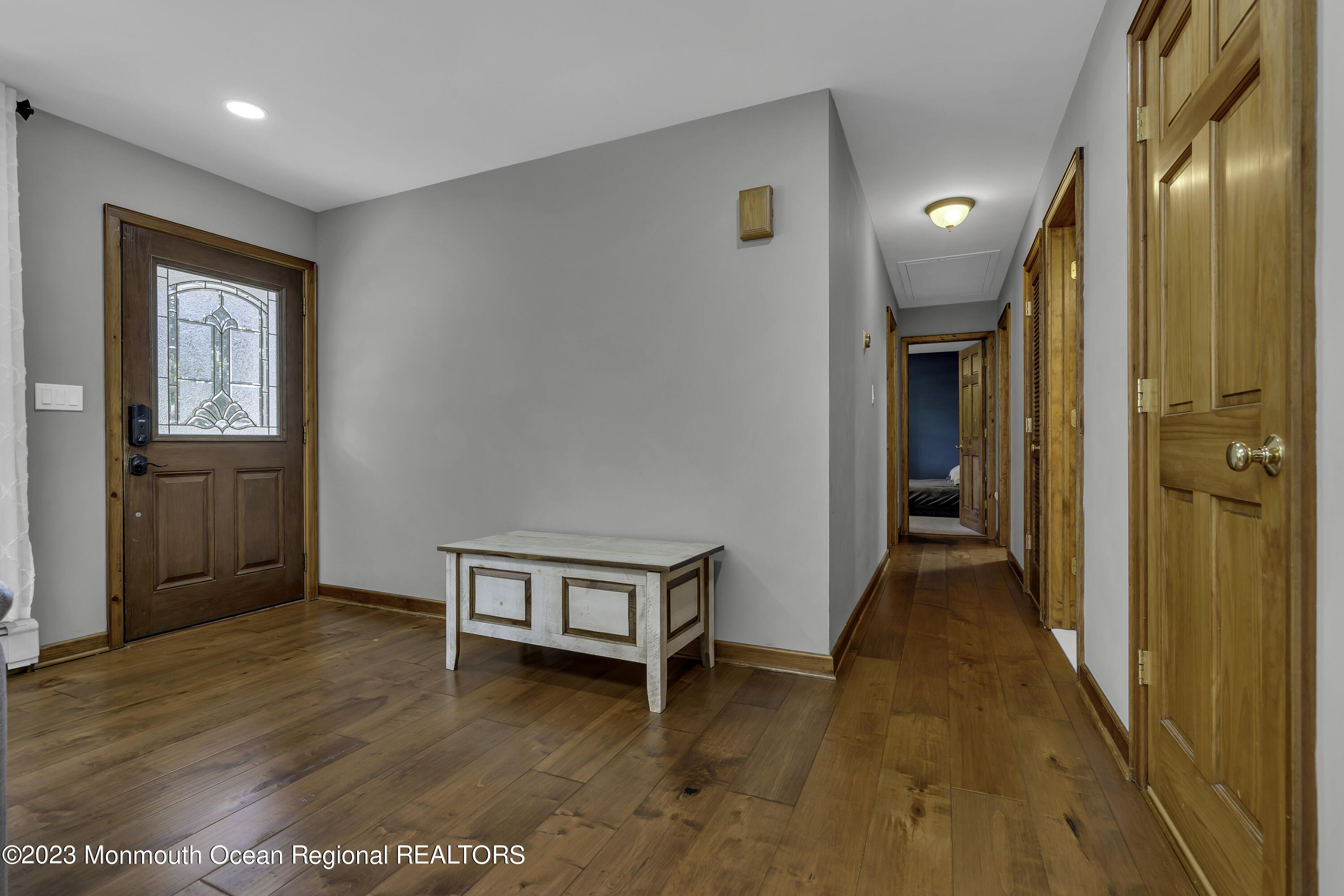 3 Allen Terrace New Egypt, NJ 08533 - Photo 9 of 97 a view of a hallway with wooden floor and staircase
