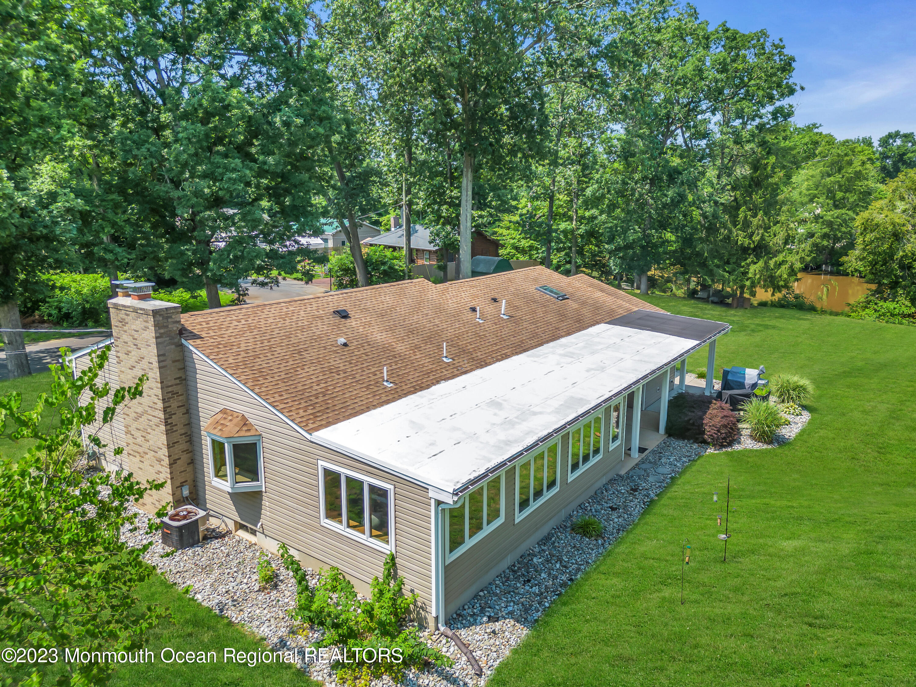 3 Allen Terrace New Egypt, NJ 08533 - Photo 93 of 97 a aerial view of a house with a big yard and large trees