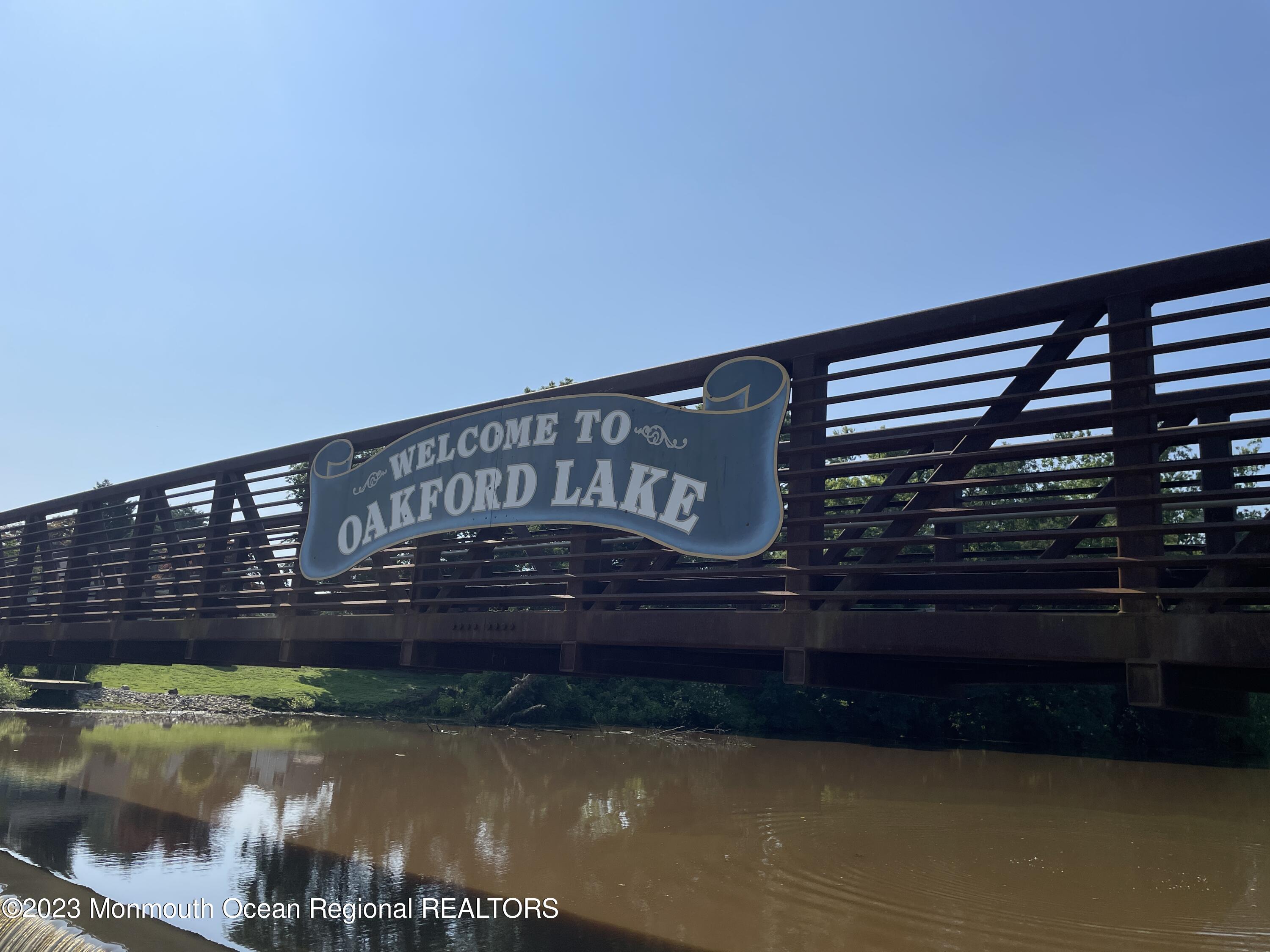 3 Allen Terrace New Egypt, NJ 08533 - Photo 97 of 97 a view of swimming pool with outdoor seating and lake view