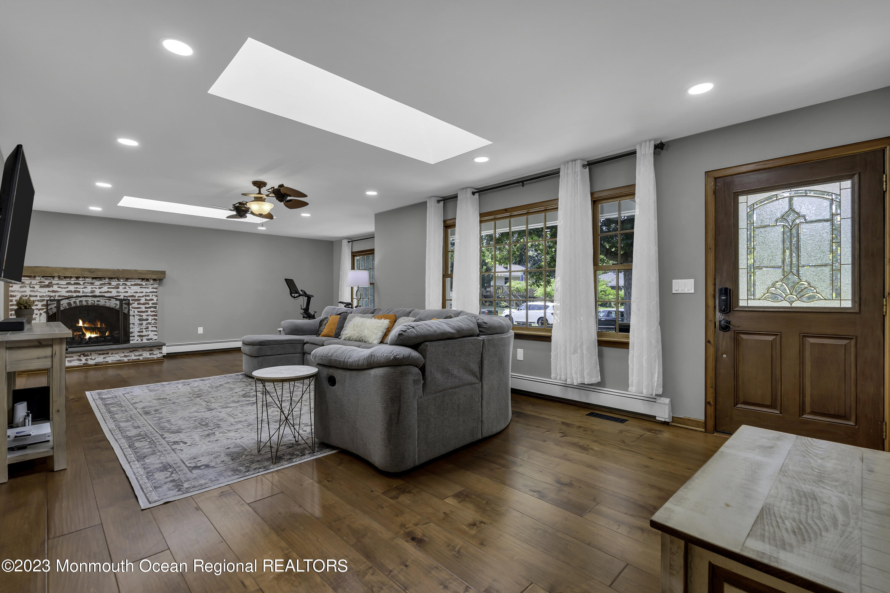3 Allen Terrace New Egypt, NJ 08533 - Photo 10 of 97 a living room with furniture and a fireplace