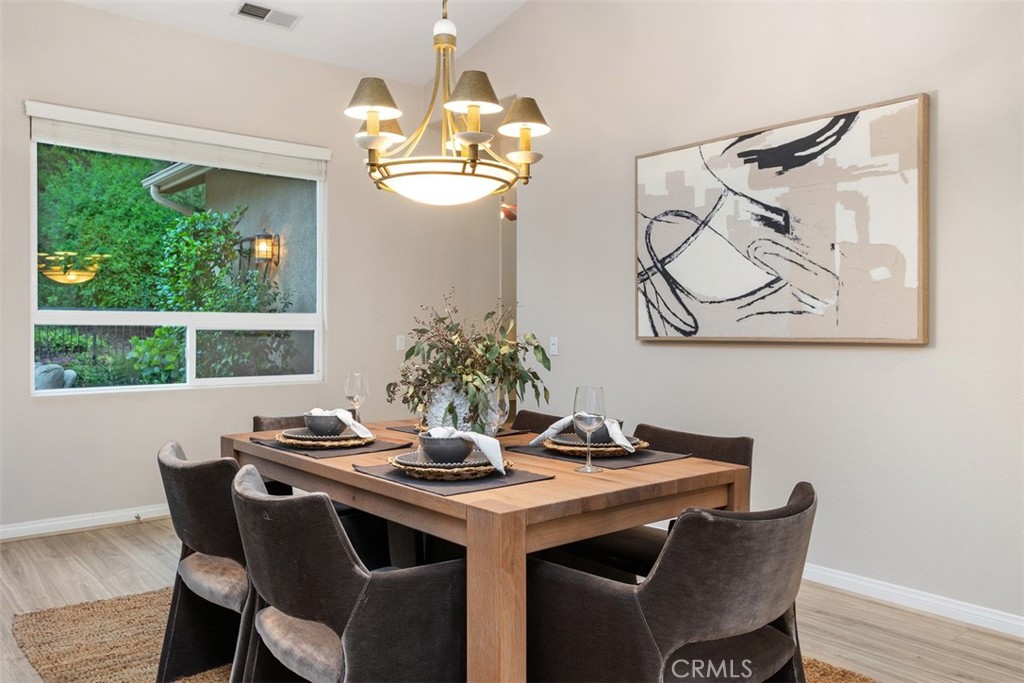 608 Inverlochy Drive Fallbrook, CA 92028 - Photo 13 of 52 a dining room with furniture and window