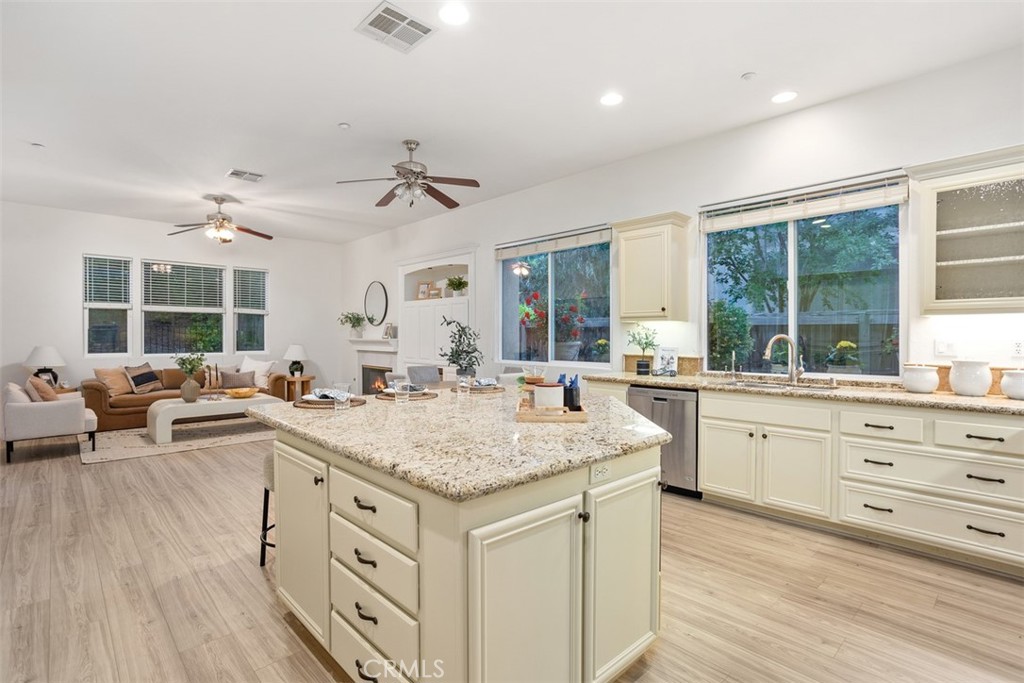 608 Inverlochy Drive Fallbrook, CA 92028 - Photo 18 of 52 a kitchen with a stove a sink and a refrigerator