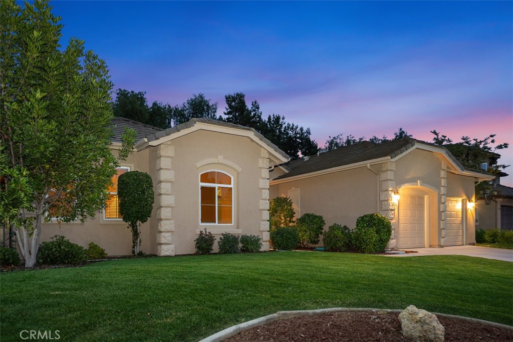 608 Inverlochy Drive Fallbrook, CA 92028 - Photo 2 of 52 a front view of a house with a garden