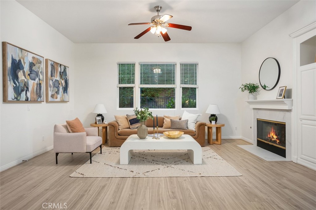 608 Inverlochy Drive Fallbrook, CA 92028 - Photo 23 of 52 a bedroom with a bed and a fireplace
