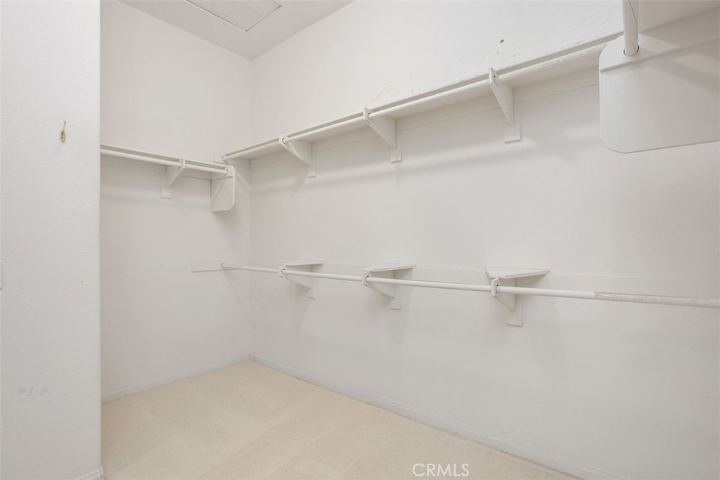 608 Inverlochy Drive Fallbrook, CA 92028 - Photo 30 of 52 a view of a room with racks on the wall