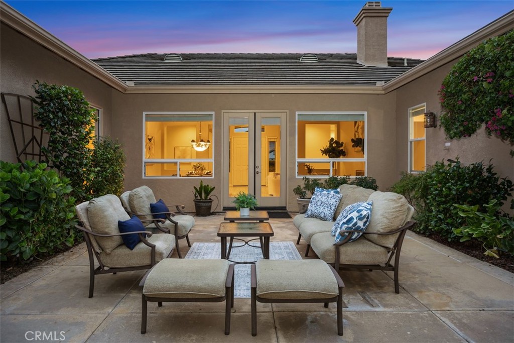 608 Inverlochy Drive Fallbrook, CA 92028 - Photo 3 of 52 a building outdoor space with patio furniture