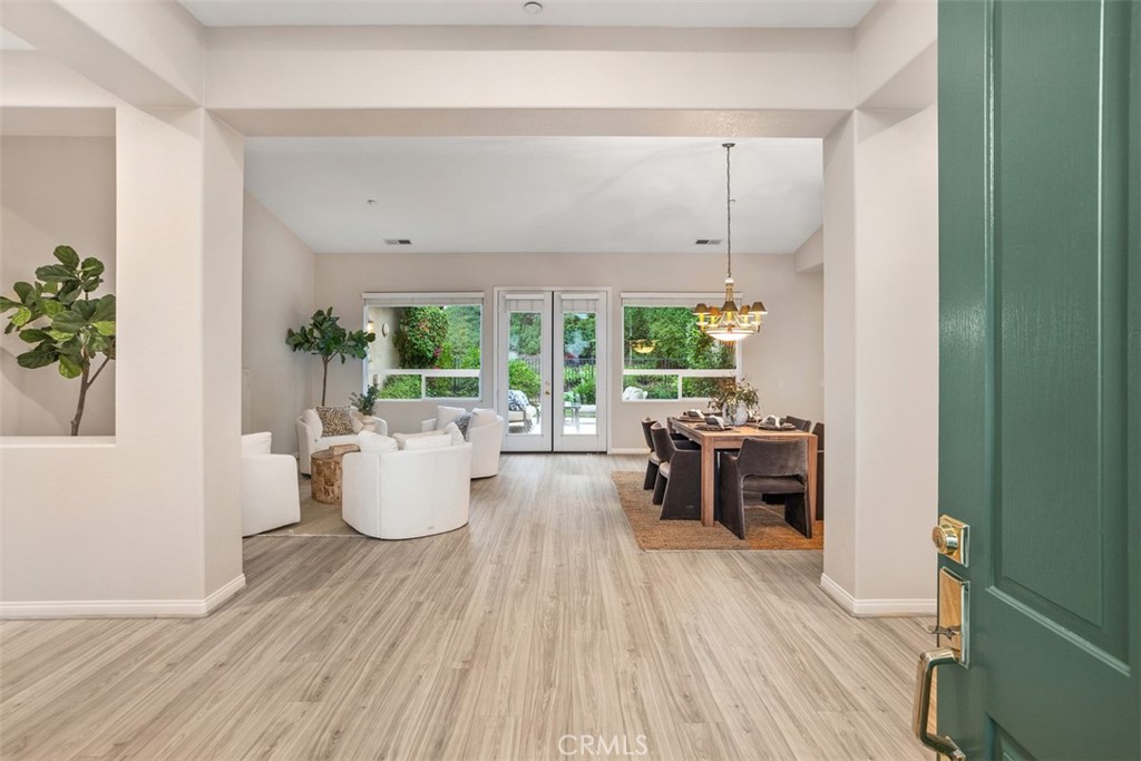 608 Inverlochy Drive Fallbrook, CA 92028 - Photo 7 of 52 a living room with furniture and a potted plant