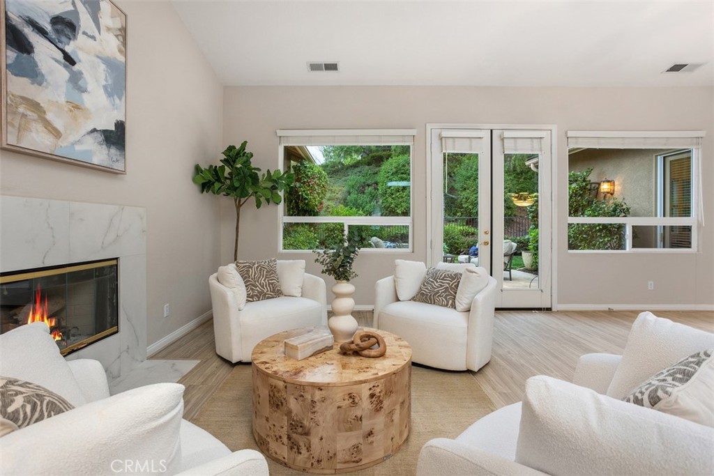 608 Inverlochy Drive Fallbrook, CA 92028 - Photo 9 of 52 a living room with furniture and a large window