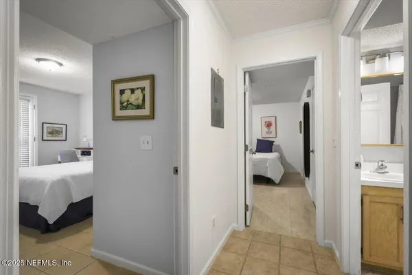 a en suite bathroom with a sink and a mirror