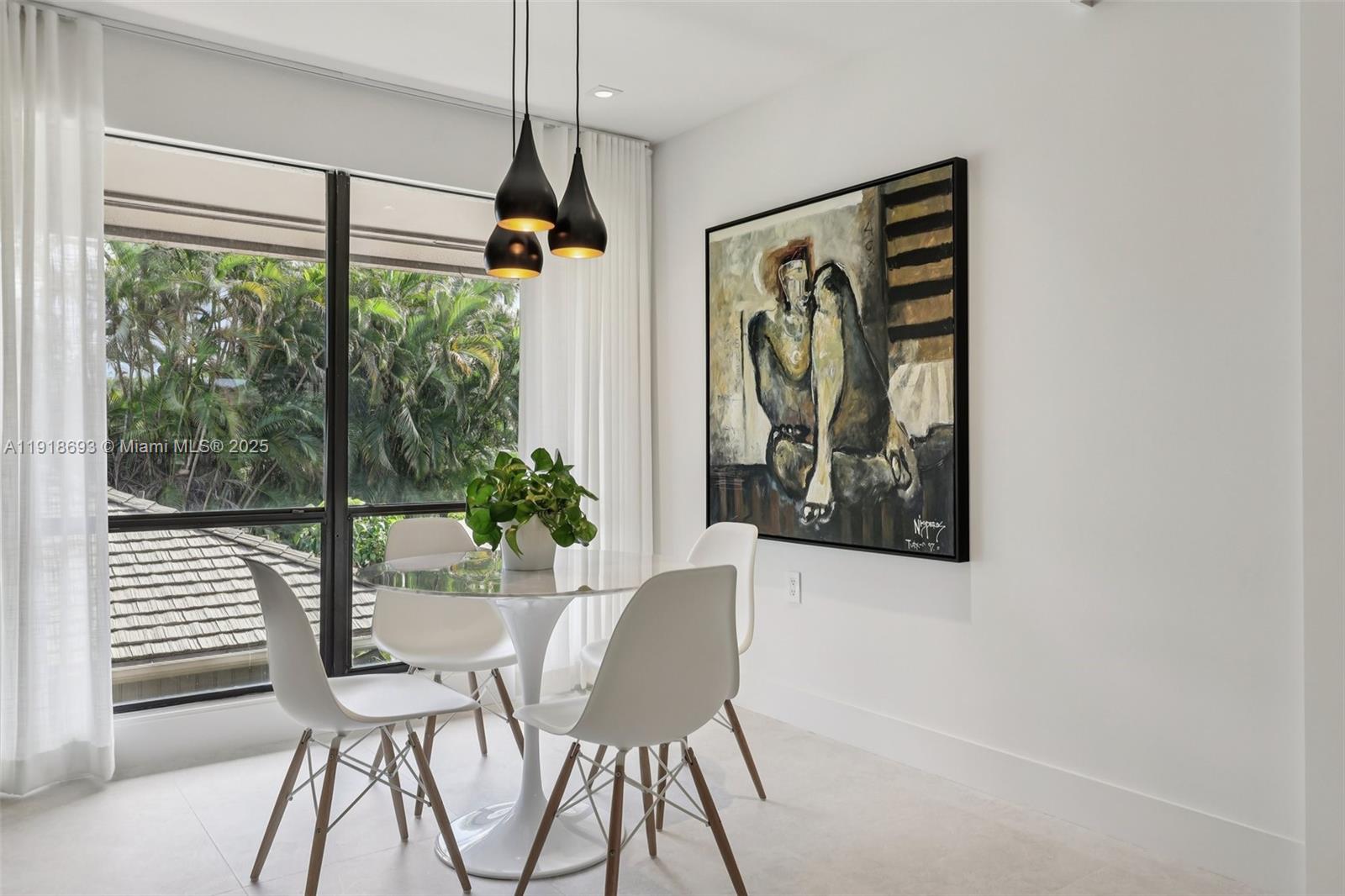 7123 Rain Forest Drive, Unit A Boca Raton, FL 33434 - Photo 15 of 75 a dining room with furniture and window