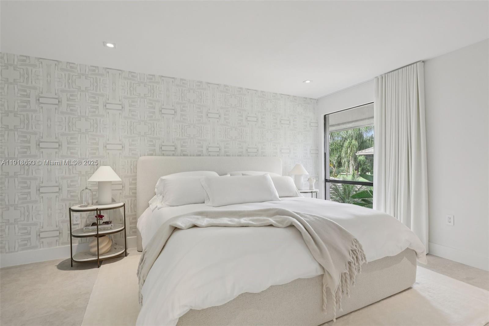 7123 Rain Forest Drive, Unit A Boca Raton, FL 33434 - Photo 25 of 75 a bedroom with a bed and a window