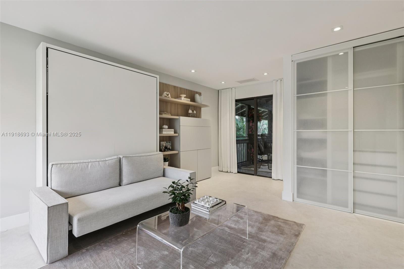 7123 Rain Forest Drive, Unit A Boca Raton, FL 33434 - Photo 40 of 75 a living room with furniture and a window