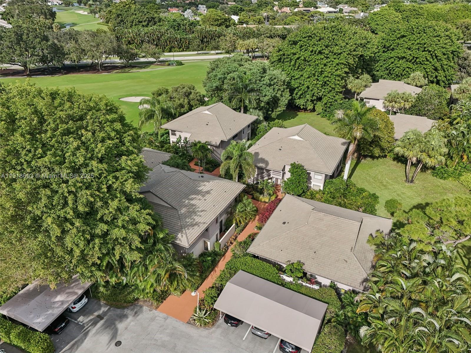 7123 Rain Forest Drive, Unit A Boca Raton, FL 33434 - Photo 63 of 75 an aerial view of a house with outdoor space patio and lake view